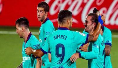 Barcelona outclass Villarreal 4-1 to stay alive in La Liga title race