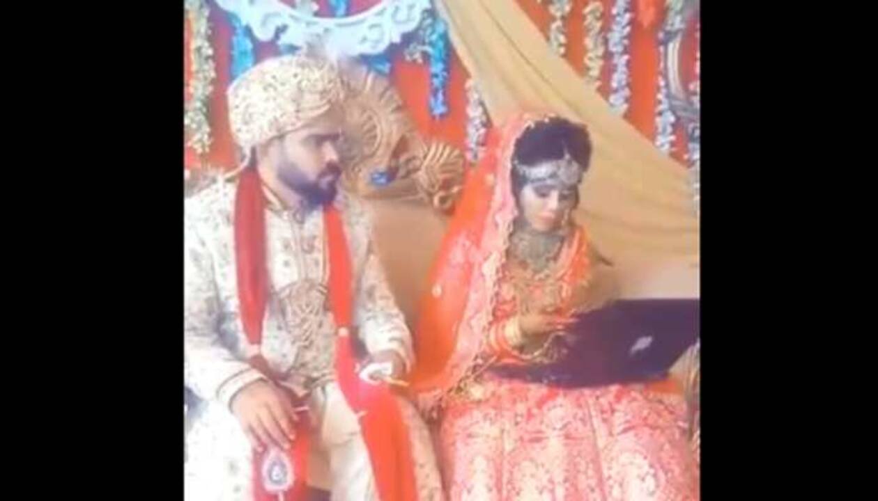 This bride's 'Work from Home' continues at her wedding, groom sits clueless  in this viral video breaking internet - Watch | viral News | Zee News