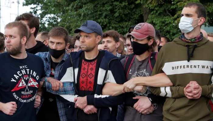 Hundreds protest in Belarus after two main challengers barred from election ballot