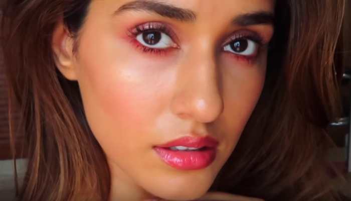 Disha Patani's bold red lips, breezy hair and minimal make-up are a perfect weekend tease!
