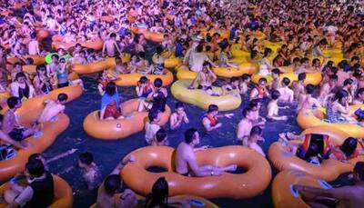 Hundreds of Chinese party at Water Park in COVID-19 epicentre Wuhan without face masks - Watch