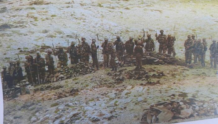 India-China face-off: Exclusive pictures emerge of Chinese troops armed  with spears, machete at LAC | India News | Zee News