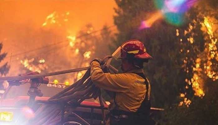 Better weather helps firefighters battling against deadly wildfires in Oregon, California