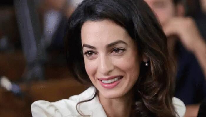 Amal Clooney quits UK envoy post over 'lamentable' international law breach