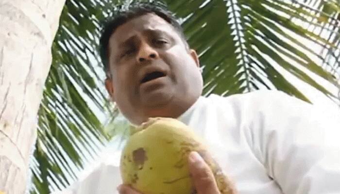 Sri Lanka&#039;s Minister of Coconut climbs tree to address press; here&#039;s why