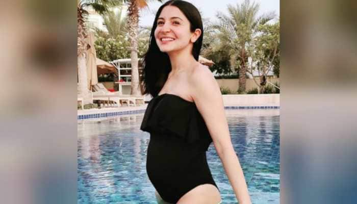 Mom-to-be Anushka Sharma looks gorgeous in black, flaunts baby bump in pool pic