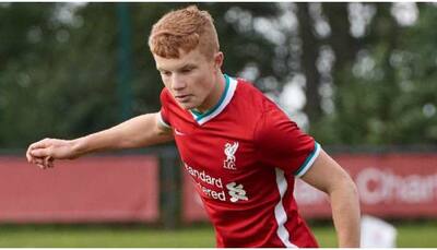 Luca Stephenson signs his first professional contract with Liverpool FC