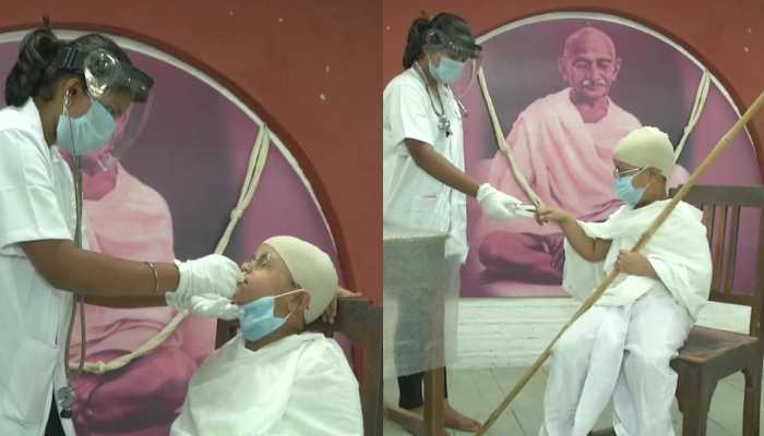 Gujarat boy undergoes COVID-19 test dressed up as Mahatma Gandhi Gujarat boy undergoes COVID-19 test dressed up as Mahatma Gandhi