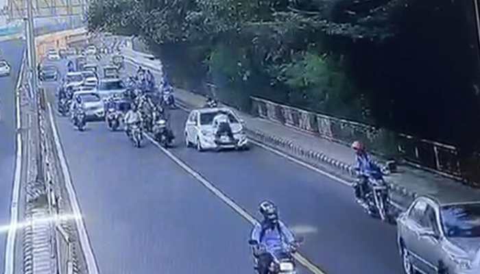 Delhi traffic policeman dragged on car bonnet for a few metres, driver arrested - WATCH