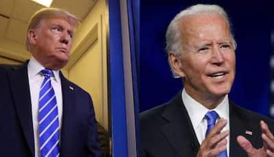 Donald Trump and Joe Biden to headline duelling town halls, as early voters swamp polls