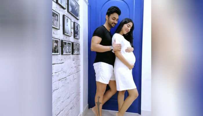 Amrita Rao cradles her baby bump in pic going viral, reveals she is 9 months pregnant