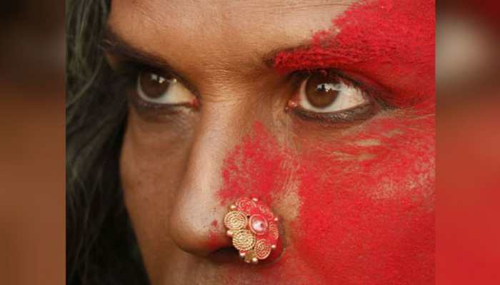 Wait, is that Milind Soman? Yes, his new look with nose ring and kajal leaves fans intrigued!