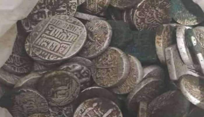 Amroha: Silver coins found in field during ploughing; villagers loot and flee 