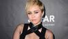 Miley Cyrus poses nude for Indian American lensman's photo book