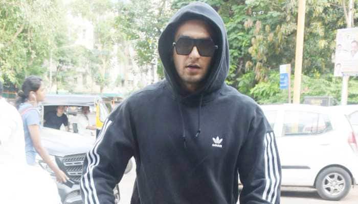 VIDEO alert: Ranveer Singh jumps on car roof, greets fans wearing mask, points at sanitising hands - Watch