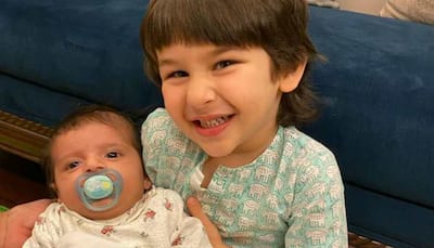 Taimur Ali Khan cradles his little friend with a million-dollar smile in this viral pic - Check out!
