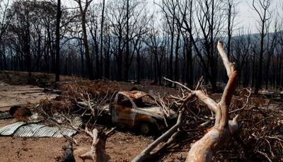 Prolonged wildfire seasons, more droughts from climate change, forecasts Australia
