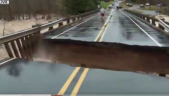 Miraculous escape for TV reporter as bridge collapses during live reporting - Watch