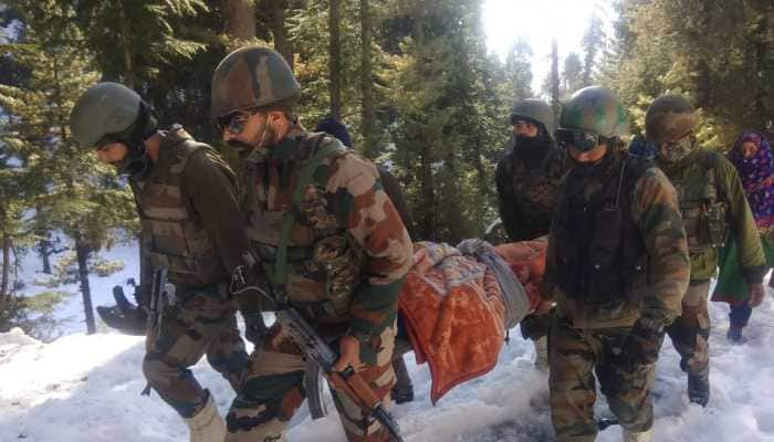 Indian soldiers help Kashmiri woman and her newborn son, take them to their home safely  