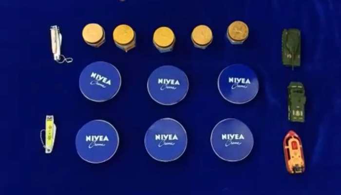 Gold worth Rs 14.12 lakh hidden inside face creams, nail clippers, toy cars seized at Chennai airport 