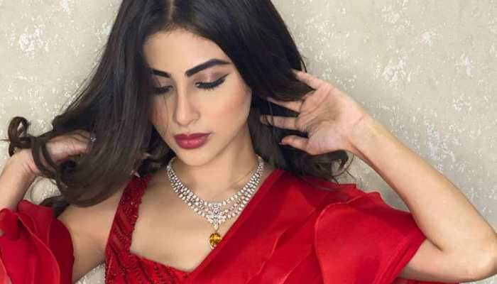 Mouni Roy sets the internet ablaze with gorgeous pics in red sari. What a diva!