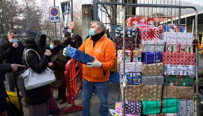 Queues form outside Italy&#039;s Milan food banks as crisis bites ahead of Christmas