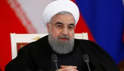 Iran President Hassan Rouhani defends execution of dissident journalist