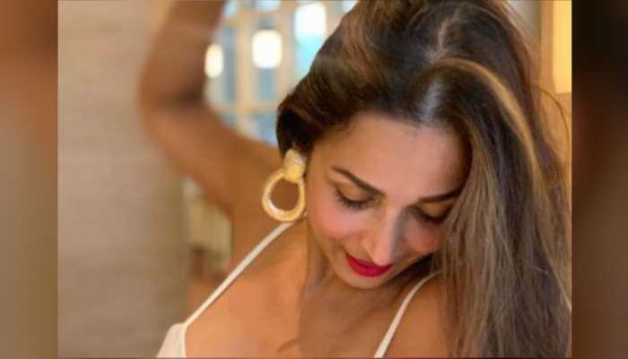 Hello, Sunday, says Malaika Arora as she steams up social media with scintillating pic in white!