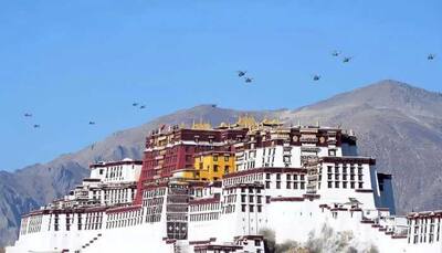 Exclusive: Rattled by protests in Tibet, China performs military air drill over Lhasa