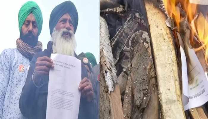 Protesting farmers burn copies of three farm laws, shout anti-govt slogans at Delhi borders
