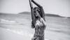 Esha Gupta flaunts perfect hourglass figure as she poses on the beach