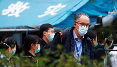 WHO-led COVID-19 probe team in China visits animal health facility 