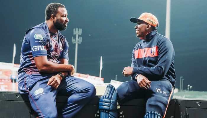 Caribbean connection with Kieran Pollard (left) and Dwayne Bravo catching up at Abu Dhabi T10 League.