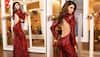 Urvashi Rautela spotted wearing velvet tracksuit at airport, flashes Louis Vuitton handbag - Check out her pics