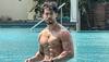 Tiger Shroff flaunts six-pack abs in shirtless pool pic, Check it out