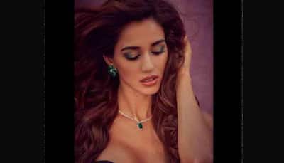 Disha Patani stuns in this black tube outfit, completes look with emerald necklace, nude lips