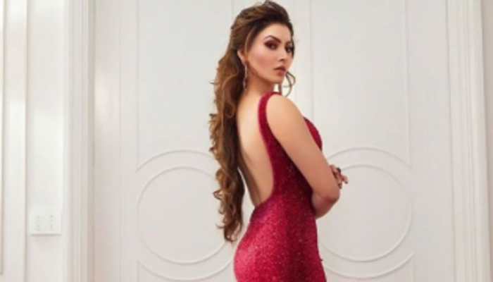 Urvashi Rautela clicked in fiery red outfit, turns heads at Mumbai airport - Pics 