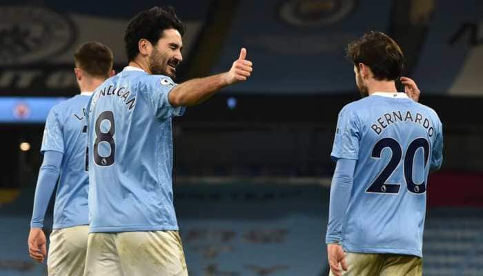 Relentless Manchester City march on, Liverpool lose again Relentless Manchester City march on, Liverpool lose again