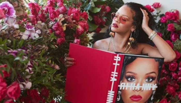 Rihanna poses topless in latest picture, sparks row over wearing Ganesha pendant! Rihanna poses topless in latest picture, sparks row over wearing Ganesha pendant!