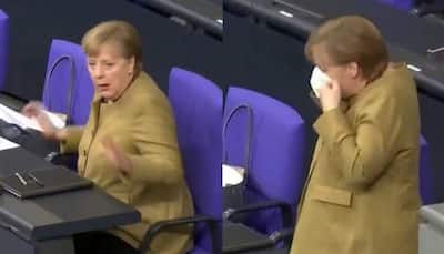 German Chancellor Angela Merkel panics after forgetting mask, netizens react - Watch