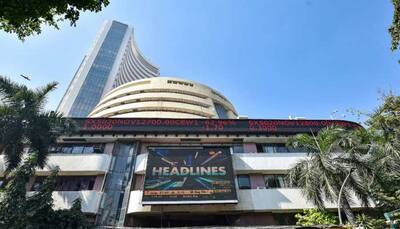 Sensex gains 300 points, Nifty above 14,800; banks, IT stocks lead