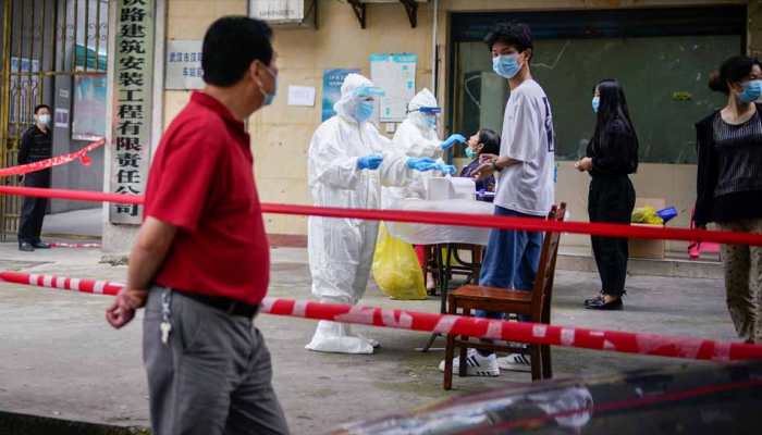China's compulsory anal COVID-19 tests for International travelers upsets visitors