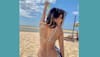 Nia Sharma runs amidst sea waves in black bikini, her BTS clip is 'too hot to handle'