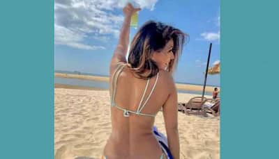 Nia Sharma runs amidst sea waves in black bikini, her BTS clip is 'too hot to handle'