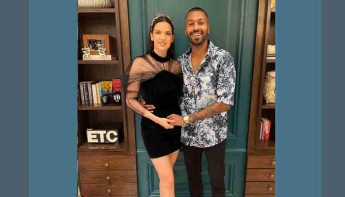 Cricketer Hardik Pandya adorably hugs ladylove Natasha Stankovic, little munchkin Agastya in this lovey-dovey photo