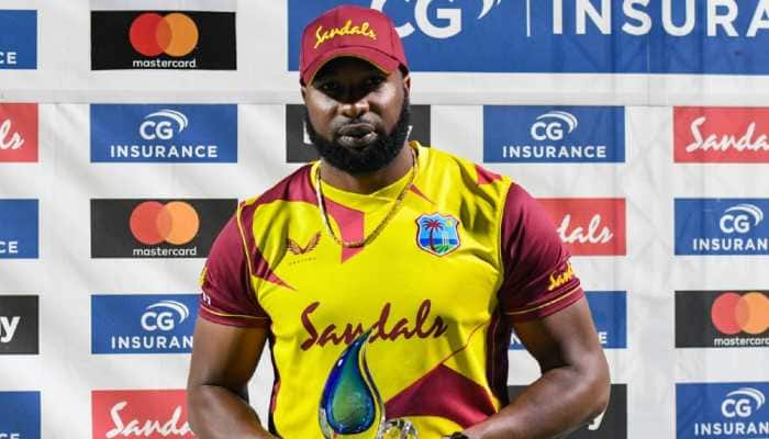 West Indies skipper Kieron Pollard is awarded the trophy after winning the T20 series against Sri Lanka 2-1. (Photo: Cricket West Indies)