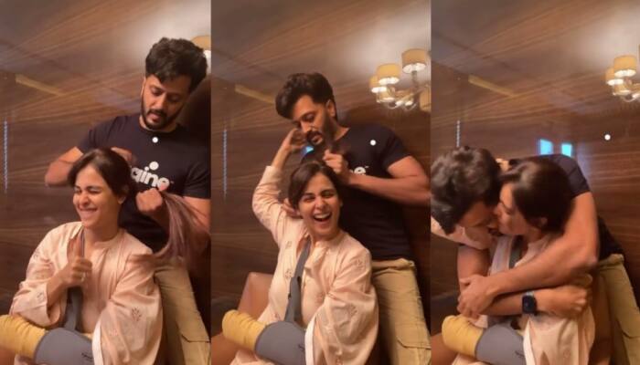Riteish Deshmukh turns hairstylist for injured wifey Genelia D'Souza in this mushy video - Watch