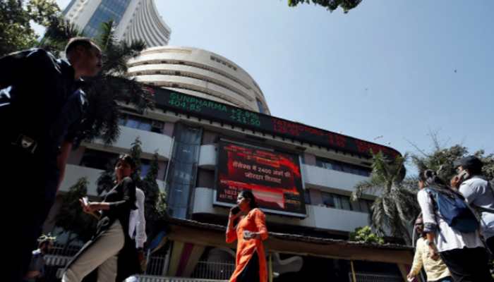 Sensex tumbles over 300 points in early trade; Nifty slips below 14,800