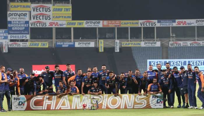 India players pose for the trophy after winning the ODI series against England