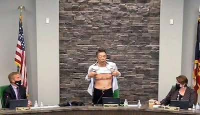 Asian-American veteran shows battle scars, asks 'is this patriot enough?' 
